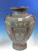 A CHINESE CHAMPLEVE ENAMELLED BRONZE HEXAGONAL SECTIONED BALUSTER VASE WITH MASK AND RING HANDLES