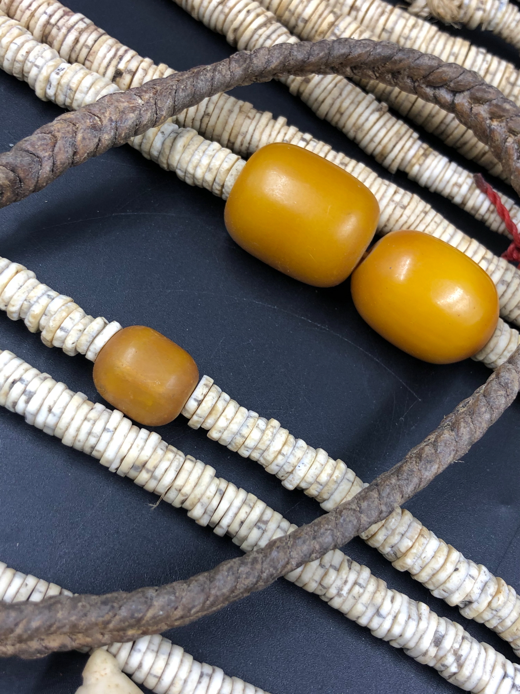 NINE STRANDS OF ETHNIC BEADED NECKLETS TO INCLUDE AMBER, BONE, IRON ETC. - Image 8 of 15