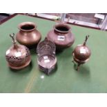 TWO ISLAMIC BRASS ONION TOPPED INCENSE BURNERS AND STANDS, AN INDIAN COPPER RICH OIL LAMP TOGETHER