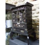 A LATE 19th/EARLY 20th C. JAPANESE BLACK LACQUER JEWELLERY CABINET, THE DRAWERS AND DOORS INLAID