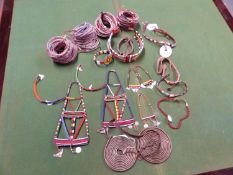 A COLLECTION OF KENYAN BEAD WORK, TO INCLUDE: BRACELETS, EARRINGS AND HEAD ADORNMENTS