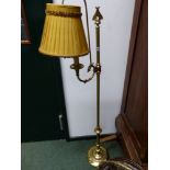 A PAIR OF BRASS ADJUSTABLE STANDARD LAMPS AND ANOTHER SIMILAR, THE PAIR WITH EAGLE HEADED CORNUCOPIA