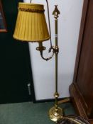 A PAIR OF BRASS ADJUSTABLE STANDARD LAMPS AND ANOTHER SIMILAR, THE PAIR WITH EAGLE HEADED CORNUCOPIA