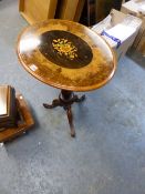 A VICTORIAN WALNUT OVAL WINE TABLE WITH CENTRAL EBONY PANEL MARQUETRIED WITH FLOWERS, THE GUN BARREL
