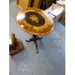 A VICTORIAN WALNUT OVAL WINE TABLE WITH CENTRAL EBONY PANEL MARQUETRIED WITH FLOWERS, THE GUN BARREL