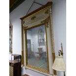 A 19th C. CONTINENTAL RECTANGULAR MIRROR WITHIN PARCEL GILT WHITE FRAME, THE SPIRAL TWIST COLUMNS