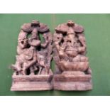 A PAIR OF INDIAN CARVED WOOD NICHES DEPICTING GANESH SEATED ON A DOUBLE LOTUS THRONE AND KRISHNA