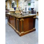 AN IMPRESSIVE LEATHER INSET CALAMANDER WOOD DESK IN THE FRENCH EMPIRE TASTE, THE SIDES WITH ORMOLU