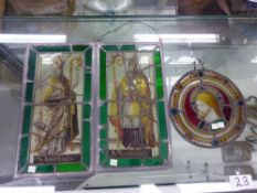 LEADED GLASS PANELS OF ST MARTINUS AND ST ANSELMUS. 42.5 x 23cms. TOGETHER WITH A ROUNDEL OF CHRIST.