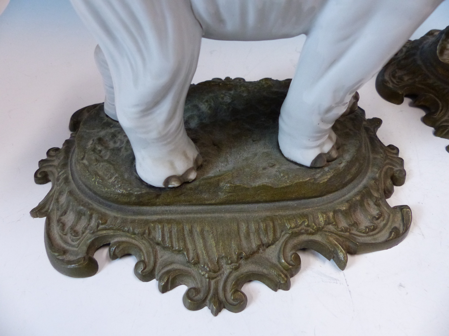 A PAIR OF ANTIQUE GERMAN PORCELAIN ELEPHANTS STANDING ON LATER ORMOLU BASES. W 26cms. - Image 7 of 8