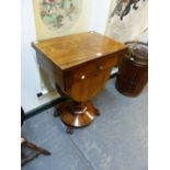 A VICTORIAN ROSEWOOD WORK TABLE, THE RECTANGULAR FLAP TOP OVER A DRAWER AND THE WORK BAG WITHIN