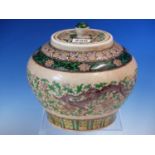 A CANTON CRACKLEWARE COMPRESSED BALUSTER JAR AND COVER PAINTED WITH BANDS OF LINGZHIH, LOTUS