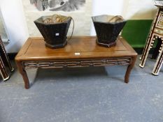 A CHINESE HARDWOOD LOW TABLE, THE RECTANGULAR TOP OVER AN OPENWORK SCROLL APRON AND SHAPED LEGS. W