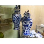 THREE CHINESE BLUE AND WHITE BALUSTER VASES, A SLEEVE VASE AND SIX VARIOUS COVERS, THE TALLEST VASE.