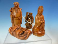 FOUR WOODEN NETSUKE, TWO DEPICTING MEN, ANOTHER KWANNON AND THE FOURTH AN ONI MASK