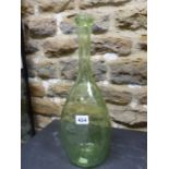 A CLUTHA STYLE PALE GREEN BUBBLED GLASS BOTTLE OF ROUNDED TRIANGULAR SECTION. H 40.5cms.1
