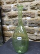 A CLUTHA STYLE PALE GREEN BUBBLED GLASS BOTTLE OF ROUNDED TRIANGULAR SECTION. H 40.5cms.1