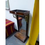 A MARBLE TOPPED REGENCY STYLE ROSEWOOD PIER TABLE, THE TOP SUPPORTED ON TWO GILT METAL BRACKETS