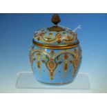 A 19th C. FRENCH JEWELLED TURQUOISE ENAMEL JAR WITH HINGED COVER CONTAINING FOUR SCENT BOTTLES.