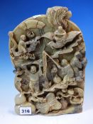 A CHINESE SOAPSTONE CARVING OF FIVE FIGURES BELOW A PINE TREE IN A MOUNTAIN RETREAT. H 38 x W