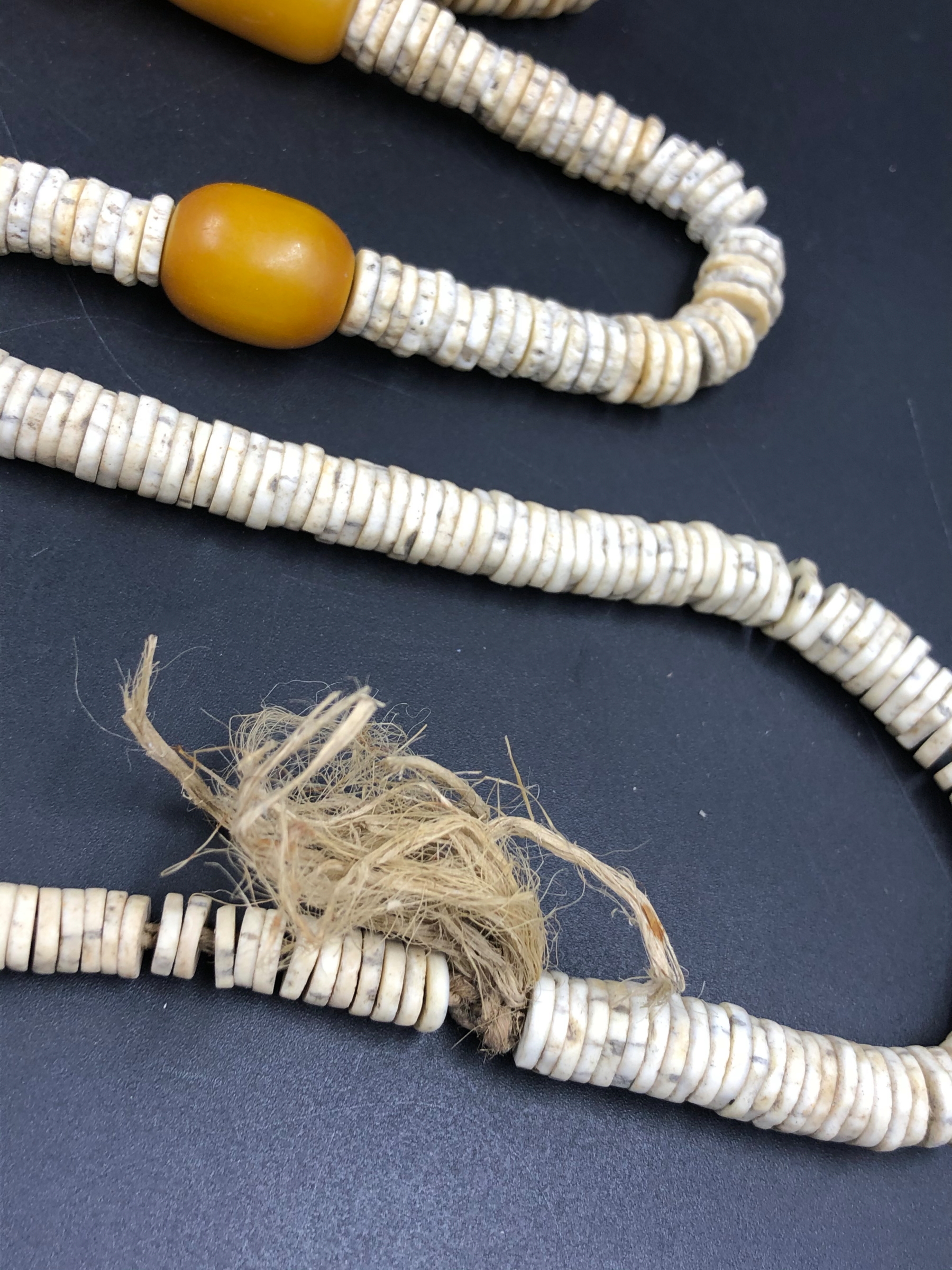 NINE STRANDS OF ETHNIC BEADED NECKLETS TO INCLUDE AMBER, BONE, IRON ETC. - Image 6 of 15