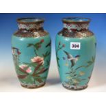 A PAIR OF JAPANESE CLOISONNE VASES WORKED WITH BIRDS AND FLOWERS ON A GREEN TURQUOISE GROUND. H