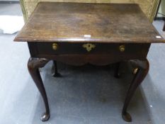 AN 18th C. OAK SIDE TABLE WITH SINGLE DRAWER, A WAVY APRON JOINING THE KNEES OF THE CABRIOLE LEGS ON