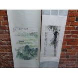 TWO CHINESE SCROLL PAINTINGS, ONE OF A BOAT AMONGST LOTUS ON A LAKE BELOW WILLOW TREES. 69.5 x