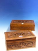 TWO CHINESE HARDWOOD BOXES, BOTH RECTANGULAR LIDS CARVED CENTRALLY WITH A VIGNETTE OF FIGURES