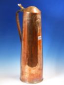 AN ART NOUVEAU GLASGOW STYLE COPPER TALL FLAGON WITH HINGED COVER WORKED WITH A LADYS HEAD