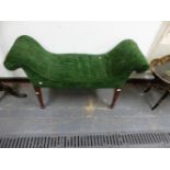 A SHERATON STYLE MAHOGANY WINDOW SEAT, THE GREEN CORDUROY ARMS CURVING DOWN INTO THE SEAT, THE