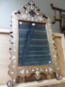 A BEVELLED GLASS RECTANGULAR MIRROR WITHIN A CUT WORK FRAME INLAID WITH MOTHER OF PEARL PETALS AND