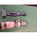 AN INDONESIAN CARVED WOOD FIGURE OF A MOTHER HOLDING HER CHILD. H 33cms. TOGETHER WITH AN AFRICAN