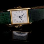 A CARTIER TANK MUST DE CARTIER ARGENT LADIES QUARTZ WATCH WITH DATE FUNCTION , WITH A SILVER GILT