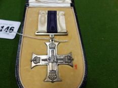 A BOXED 1939 MILITARY CROSS WITH RIBBON