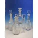 FIVE VARIOUS CLEAR GLASS DECANTERS AND VARIOUS STOPPERS, FOUR 19th C. AND OF CUT GLASS, THE OTHER