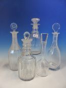 FIVE VARIOUS CLEAR GLASS DECANTERS AND VARIOUS STOPPERS, FOUR 19th C. AND OF CUT GLASS, THE OTHER