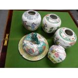 FOUR CHINESE POLYCHROME JARS TOGETHER WITH A VASE LID. Dia. 25cms.