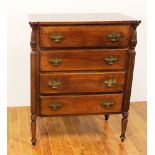 Late 19th century Sheraton mahogany four drawer chest, fluted columns topped by acanthus carving,