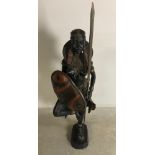 African bronze sculpture of standing female figure, 39" H x 13". Provenance: From a Los Angeles,