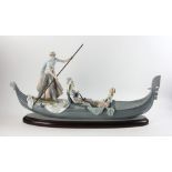 Lladro porcelain gondola with figure, artist signed, 30 1/2" H x 6" W. Provenance: From a Lynnfield,