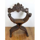 19th century Italian carved chair, 27" H x 22" W x 39" D. Provenance: From a Winchester,