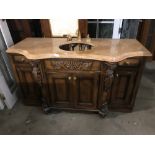 Fancy marble top vanity with sink and gold plated handles, 34" H x 63 1/2" W x 28" D. Note: Marble