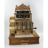 Fancy antique brass National cash register. Provenance: From a Manchester, Massachusetts estate.