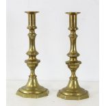 Pair of Queen Anne brass push-up candlesticks, 11" H. Provenance: From a Saugus, Massachusetts