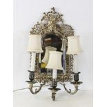 Silver bronze mirrored sconce, 19" H x 9 1/2" W. Provenance: From a New York, New York estate.