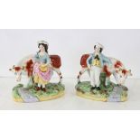 Pair of Staffordshire figures, boy and girl with cow. Provenance: From a Saugus, Massachusetts