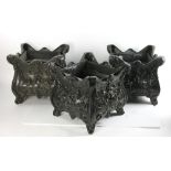 Three Victorian-style black painted metal planters, 13" H x 12" W x 12" D. Provenance: From a