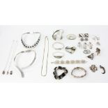 Collection of sterling silver designer jewelry, approximately 16.3 troy oz TW. Provenance: From a