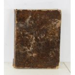 Leather bound prayer book in Hebrew, dated 1860, 12" x 9".